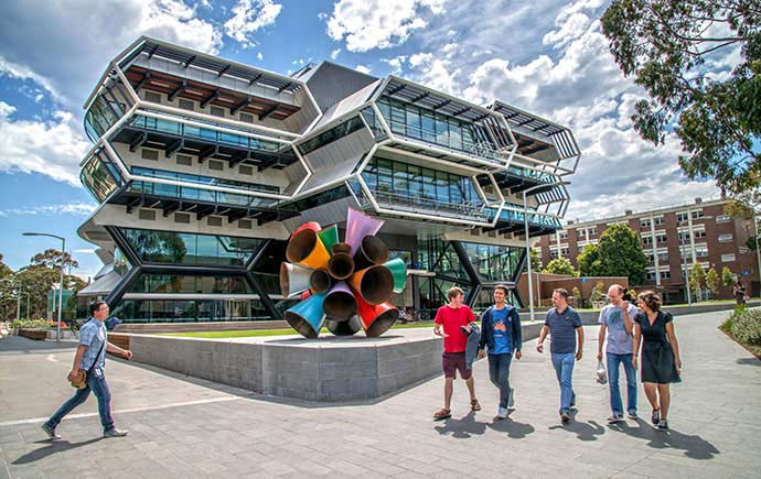 clayton-campus-students-walk-green-chemical-futures-building-2015